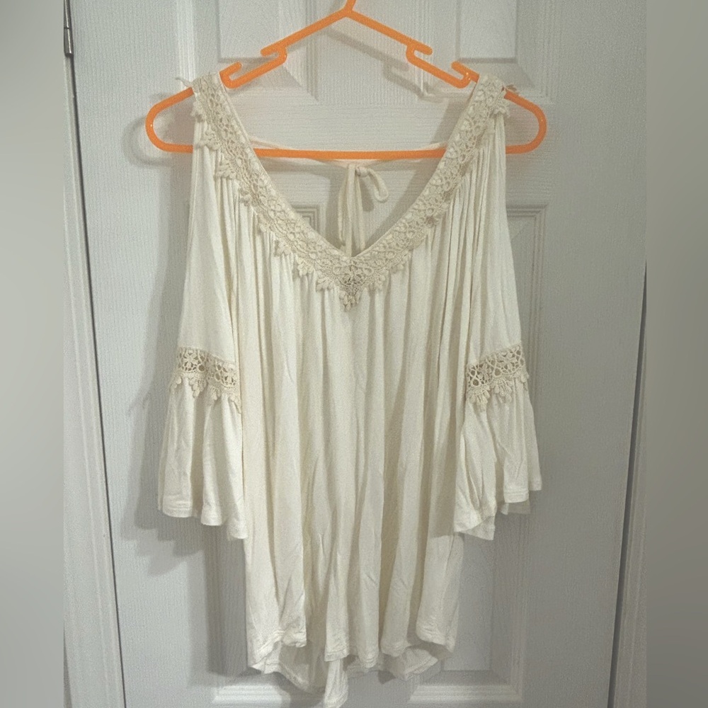 Lace accented off white top